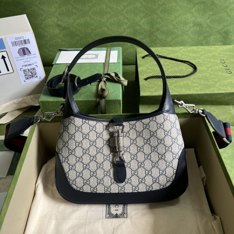 G*u*i top handle bags